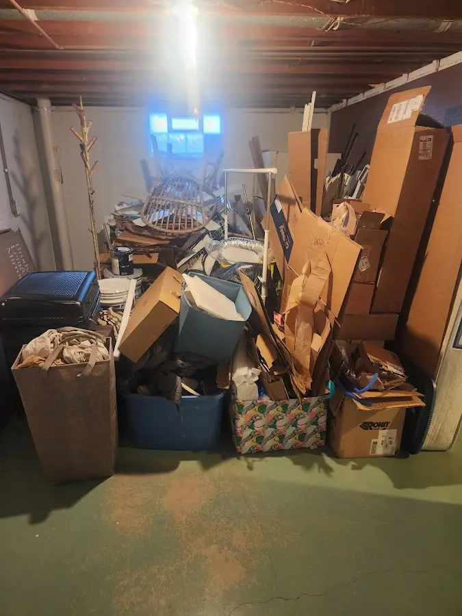 Roll-off dumpster container at job site for 2 Yard Dumpster Rental in Ravenna